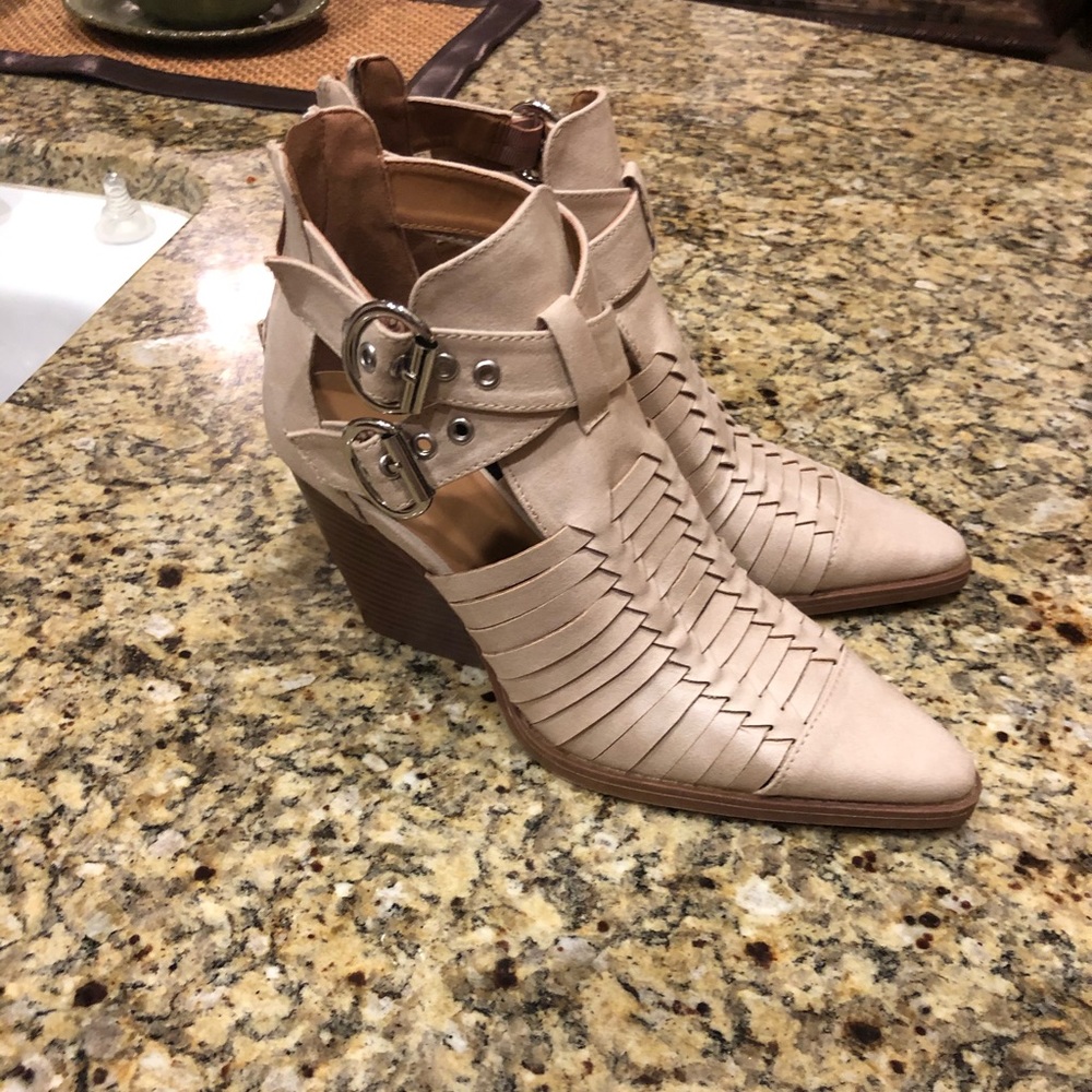 Brand new caged booties size 7